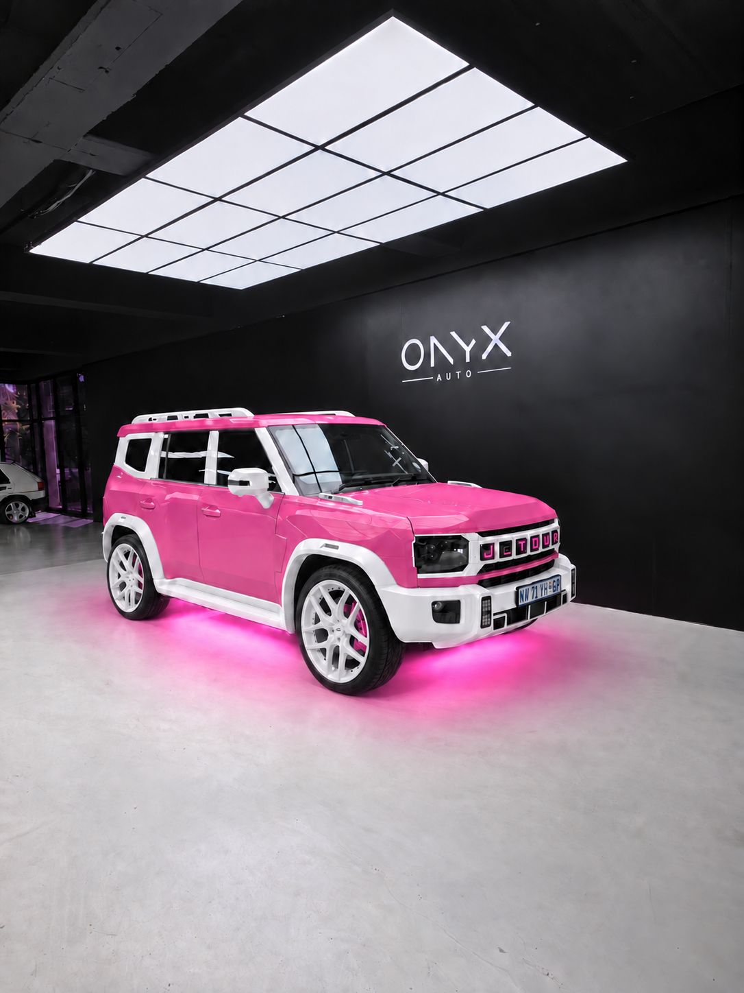 Jetour Life with a soft pink underglow